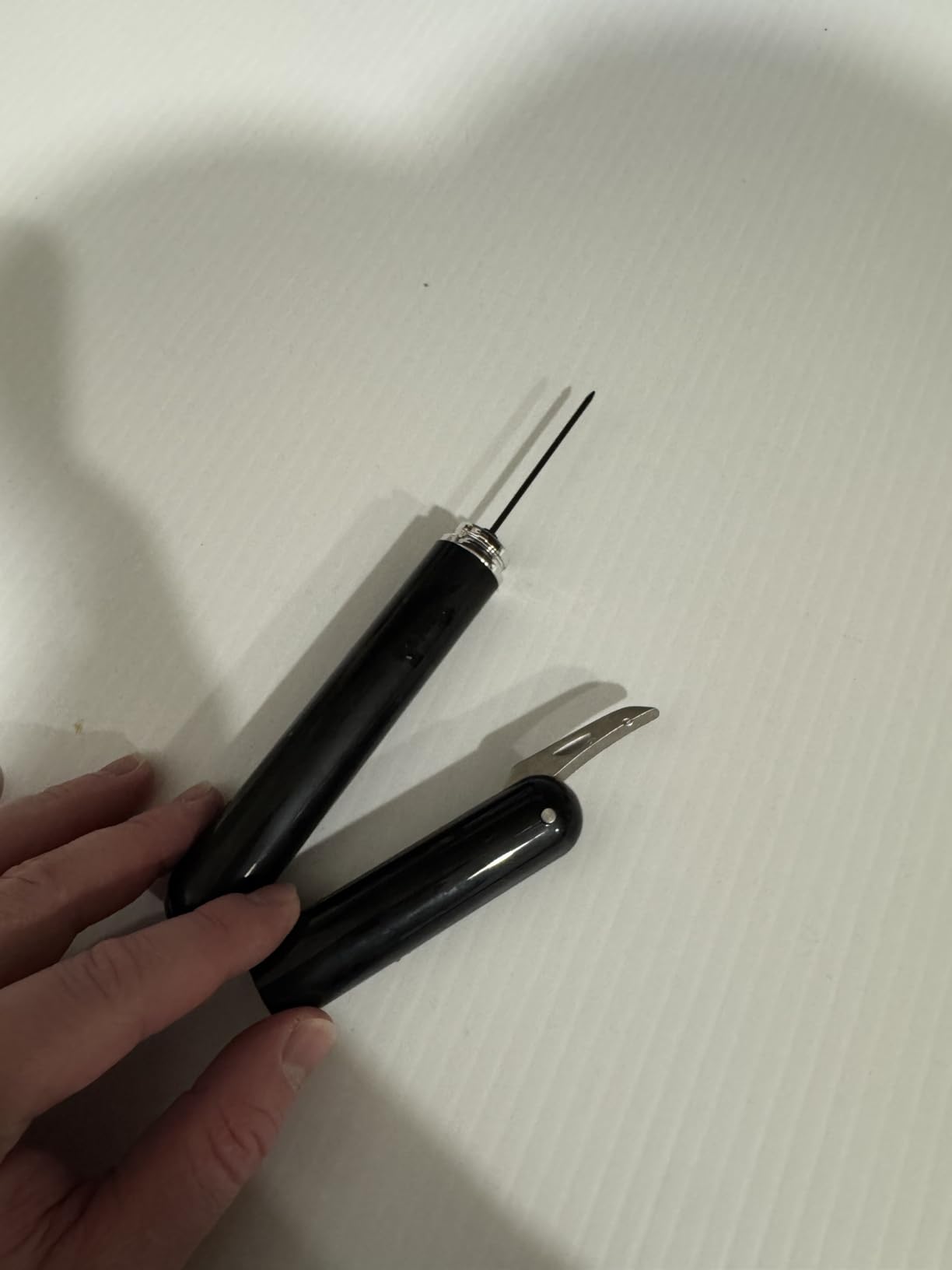 Air pressure wine opener needle and foil cutter