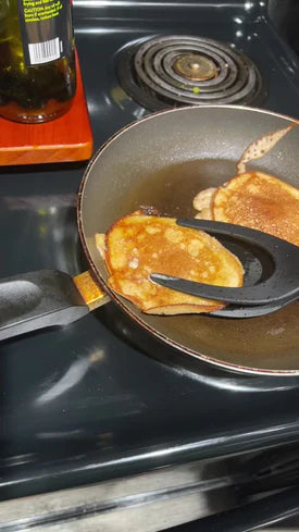 Customer using 2-in-1 Grip Flip Tongs for pancakes